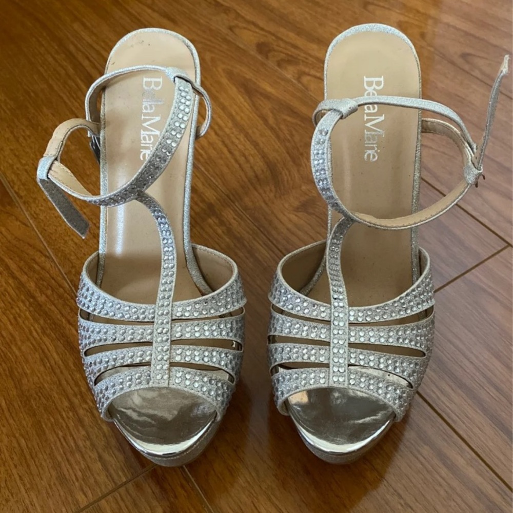 Silver high heeled shoes